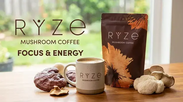 A mug of hot RYZE mushroom coffee next to a pouch of RYZE Mushroom Coffee blend, surrounded by functional mushrooms like Reishi and Lion's Mane on a wooden table.